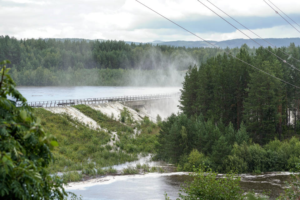 The Braskreidfoss Power plant is pictured in Braskereidfoss, Norway, Wednesday, Aug. 9, 2023. Authorities in Norway are considering blowing up a dam at risk of bursting after days of heavy rain to prevent downstream communities from getting deluged. The Glama, Norway’s longest and most voluminous river, is dammed at the the Braskereidfoss hydroelectric power plant, which was under water and out of operation on Wednesday. (Cornelius Poppe/NTB Scanpix via AP)