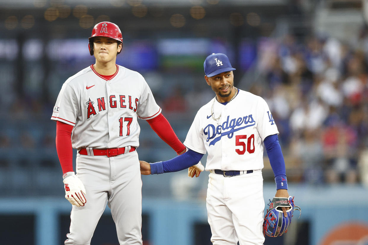 Shohei Ohtani and Mookie Betts during a game this past July. (Ronald Martinez/Getty Images)