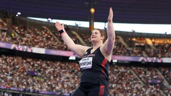 Sabrina Fortune acknowledges fans after winning the gold medal 