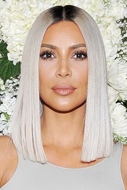 <p>Kim Kardashian infamously transformed her naturally dark brown hair into a bleached blonde bob overnight in time for Paris Fashion Week.</p>
