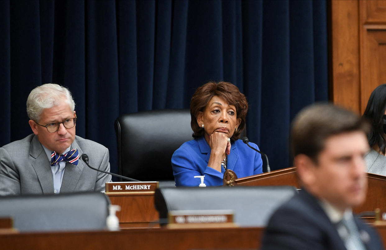 Rep. Patrick McHenry (R-NC) and Rep. Maxine Waters (D-CA) listen to Federal Reserve Board Chair Jerome Powell (not pictured) as he testifies before a House Financial Services Committee hearing in Washington, U.S., June 23, 2022. REUTERS/Mary F. Calvert