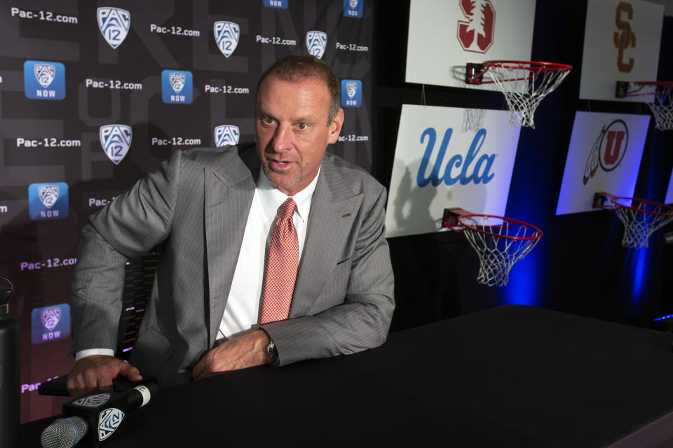 Utah head coach Larry Krystkowiak speaks during the Pac-12 NCAA college basketball media day, in San Francisco, Tuesday, Oct. 8, 2019. (AP Photo/D. Ross Cameron)