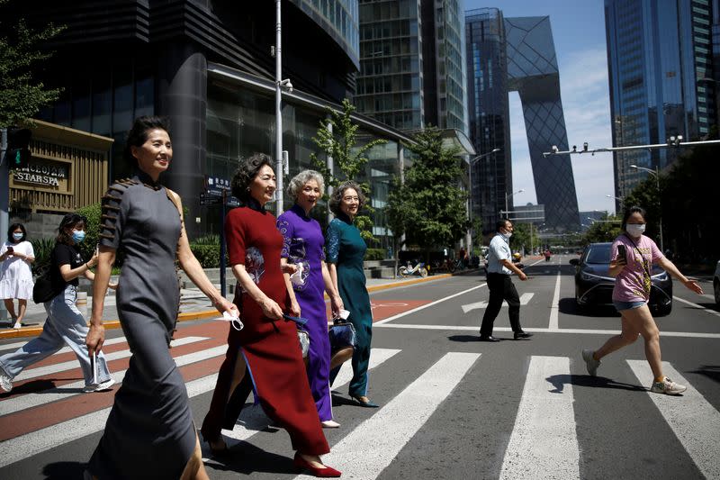 Elderly model group "Glamma Beijing" perform catwalk in Beijing's CBD area following the coronavirus disease (COVID-19) outbreak