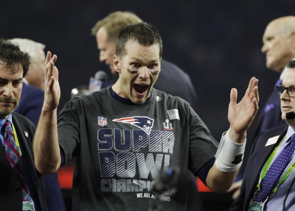 Tom Brady could get some help finding his missing Super Bowl LI jersey from the Texas Rangers. (AP)