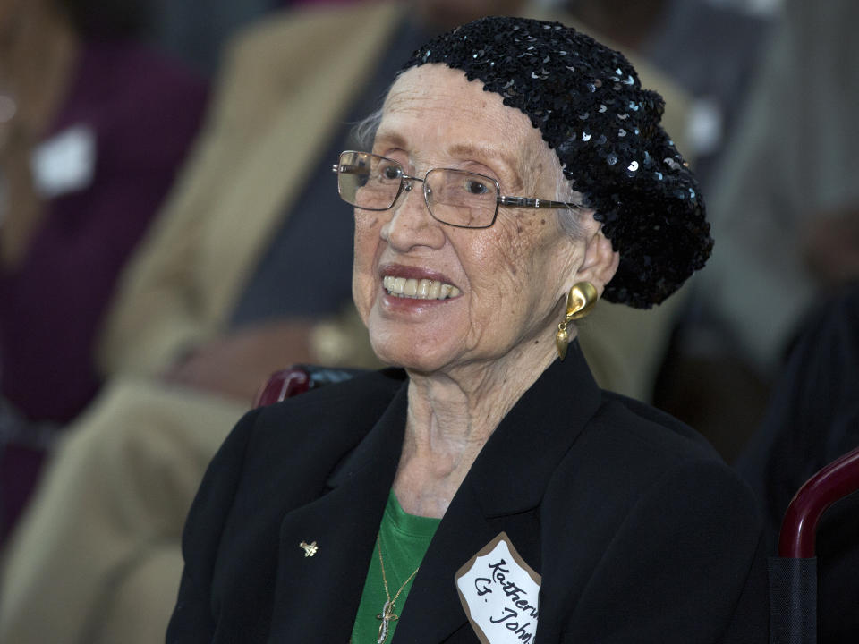 FILE - In this Feb. 22, 2016, file photo, provided by NASA, Katherine G. Johnson is honored at the Virginia Air and Space Center in Hampton, Va. Johnson, 101, a mathematician who calculated rocket trajectories and earth orbits for NASA's early space missions and was later portrayed in the 2016 hit film "Hidden Figures," about pioneering Black female aerospace workers, died, Feb. 24. (NASA via AP, File)