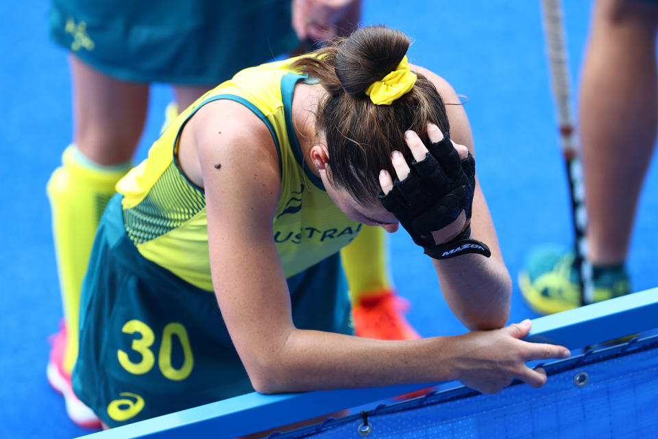 Tokyo 2020 Olympics - Hockey - Women - Quarterfinal - Australia v India - Oi Hockey Stadium, Tokyo, Japan - August 2, 2021. Grace Stewart of Australia reacts after they lost their match. REUTERS/Bernadett Szabo