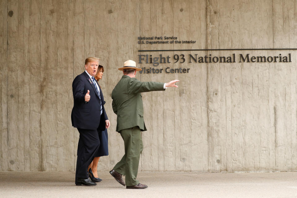 <p>U.S. President Donald Trump and first lady Melania Trump walk with park superintendent Stephen Clark at the Flight 93 National Memorial during the 17th annual September 11 observance at the memorial near Shanksville, Pa., Sept. 11, 2018. (Photo: Kevin Lamarque/Reuters) </p>