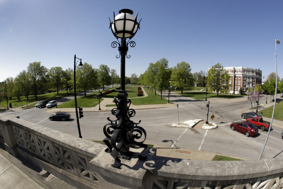 FILE - In this April 26, 2019, file photo, ornate architecture adorns structures in the median of the newly-named Dr. Martin Luther King Jr. Blvd. in Kansas City, Mo. More than 50 years after the King was assassinated, the city's efforts to honor the civil rights leader has met opposition from citizens opposed to renaming of The Paseo, one of the city's iconic boulevards. (AP Photo/Charlie Riedel, File)