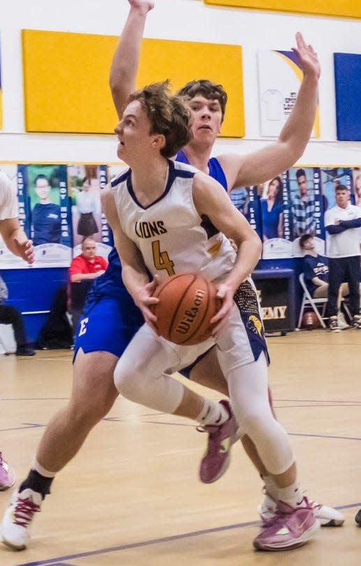 Lighthouse Christian's Coda Snyder makes a move to the basket against Eminence on Dec. 5, 2022.