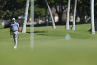 Stewart Cink watches his ball land on the 18th green during the second round of the Sony Open golf tournament Friday, Jan. 15, 2021, at Waialae Country Club in Honolulu. (AP Photo/Jamm Aquino)