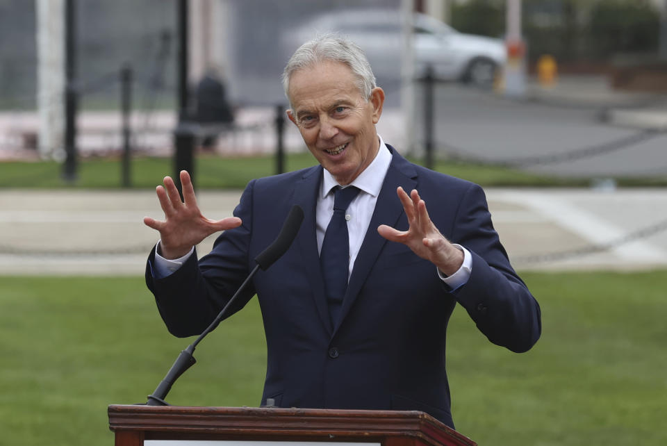 Former British Prime Minister Tony Blair speaks at the unveiling of a bust of the former senator George Mitchell, a three-day international conference at Queen's University Belfast to mark the 25th anniversary of the Good Friday Agreement, in Belfast, Northern Ireland, Monday, April 17, 2023. Former U.S. President Bill Clinton and past leaders of the U.K. and Ireland are gathering in Belfast on Monday, 25 years after their charm, clout and determination helped Northern Ireland strike a historic peace accord. (Liam McBurney/PA via AP)