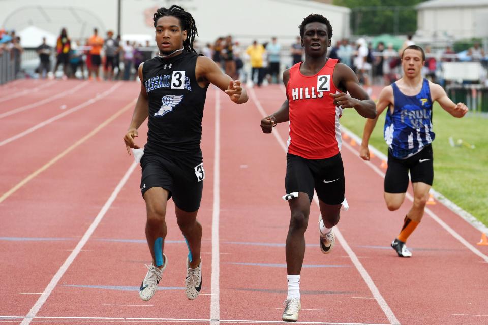 NJSIAA Track & Field Meet of Champions at Jost Field in South Plainfield on Saturday, June 19, 2021. (Left) Keshon Holt, of Passaic Tech, and Joshua Babe, of Morris Hills, compete in the 200-meter final.