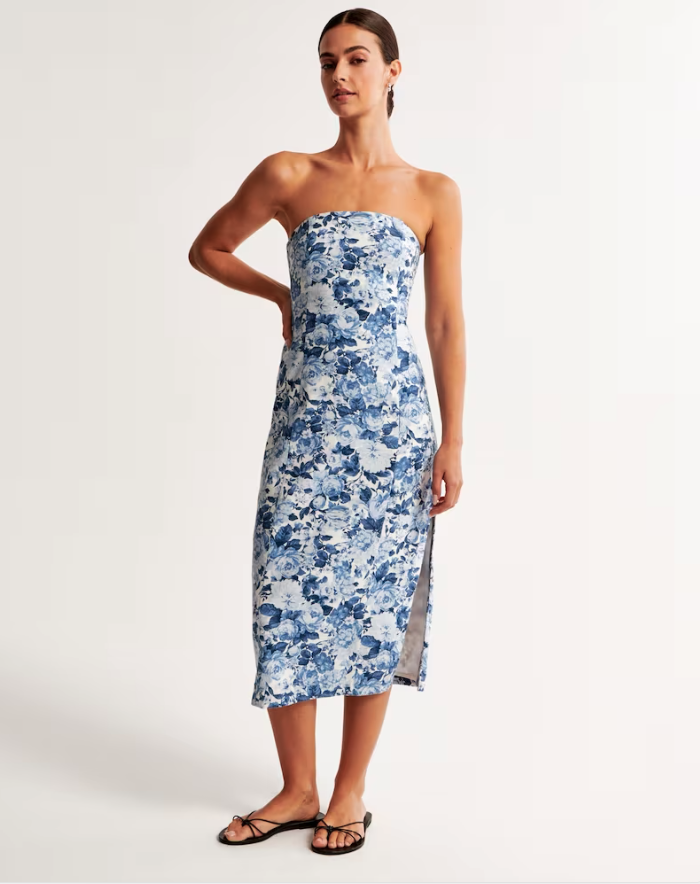 Model wears Abercrombie Strapless Linen-Blend Midi Dress in blue white floral print