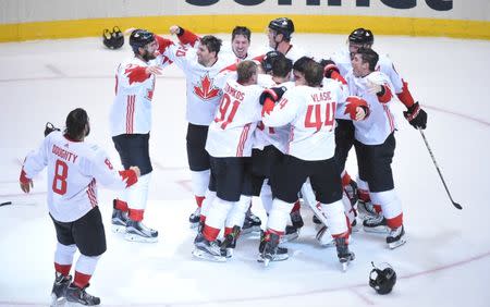 Sep 29, 2016; Toronto, Ontario, Canada; Team Canada players celebrate on the ice after defeating Team Europe 2-1 in game two of the World Cup of Hockey final to win the tournament at Air Canada Centre. Mandatory Credit: Dan Hamilton-USA TODAY Sports