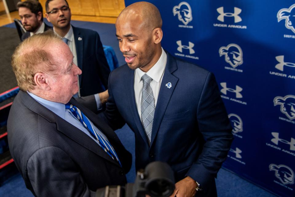 Seton Hall welcomes Shaheen Holloway as the new men's basketball head coach during a press conference at Seton Hall in South Orange on Thursday March 31, 2022. Former New Jersey Governor Richard Codey and coach Shaheen Holloway have a quick chat. 