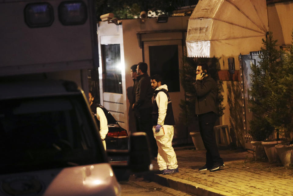 Turkish police officers gather as they prepare to enter the Saudi Arabia's Consulate in Istanbul, Monday, Oct. 15, 2018. Turkish crime scene investigators dressed in coveralls and gloves entered the consulate Monday, nearly two weeks after the disappearance and alleged slaying of Saudi writer Jamal Khashoggi there. (AP Photo/Petros Giannakouris)