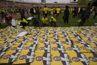 Supporters of Kenyan presidential candidate William Ruto wait for their candidate at his final electoral campaign rally at Nyayo stadium in Nairobi, Kenya Saturday, Aug. 6, 2022. Kenya is due to hold its general election on Tuesday, Aug. 9 as the East Africa's economic hub chooses a successor to President Uhuru Kenyatta. (AP Photo/Ben Curtis)