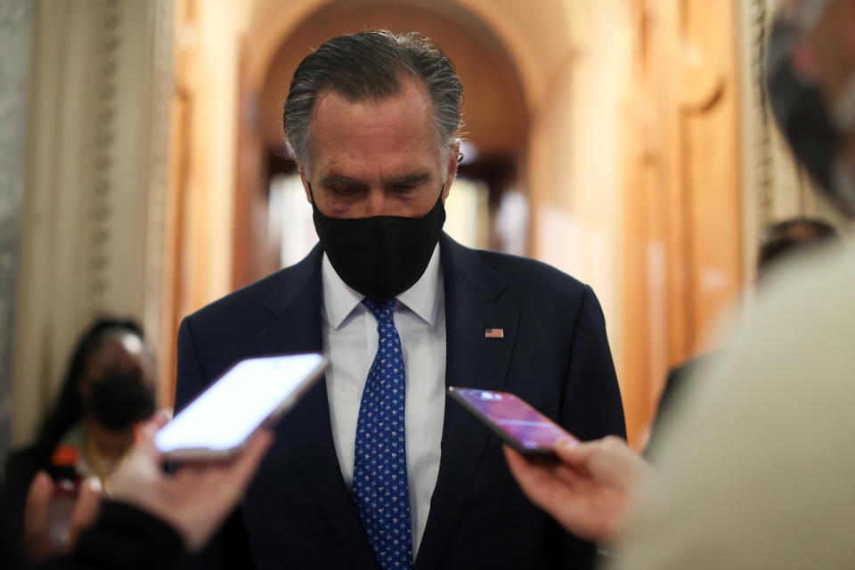 Senator Mitt Romney speaks with reporters at the U.S. Capitol on March 1, 2021. / Credit: JONATHAN ERNST / REUTERS