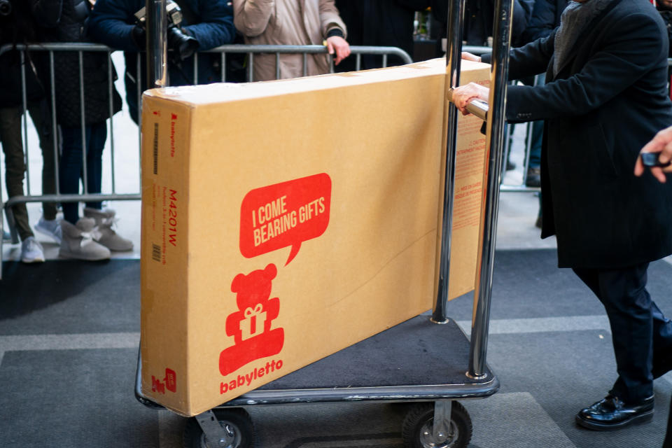 A large box from eco-friendly nursery furniture label Babyletto was photographed being delivered to the hotel prior to Meghan’s show [Photo: Getty]