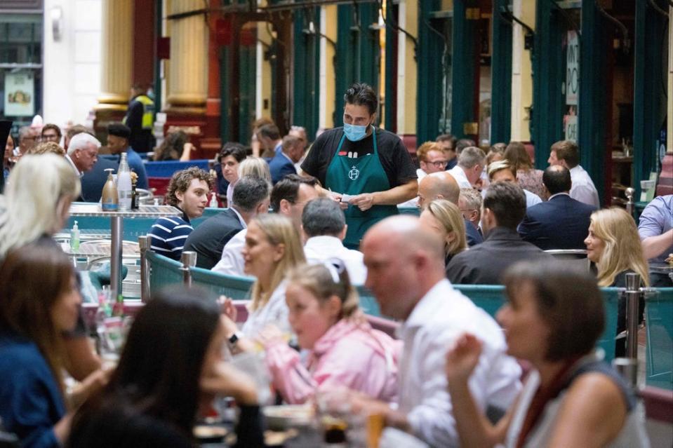 Keeping what’s given: restaurant staff will keep tips given via both cash and card  (AFP via Getty Images)