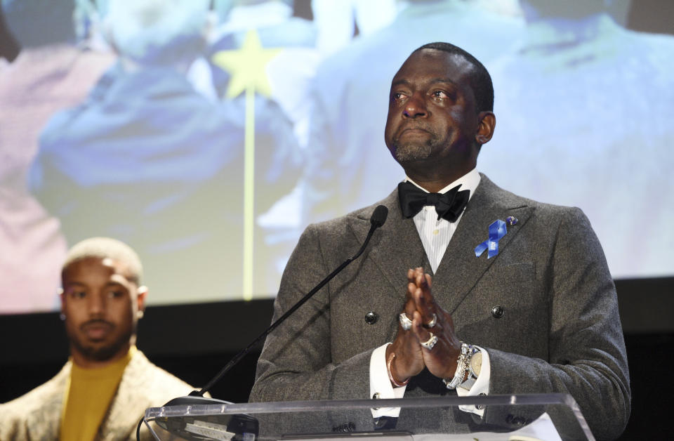 Honoree Yusef Salaam, right, becomes emotional as he addresses the audience at the ACLU SoCal's 25th Annual Luncheon at the JW Marriott at LA Live, Friday, June 7, 2019, in Los Angeles. Looking on at left is presenter Michael B. Jordan. (Photo by Chris Pizzello/Invision/AP)