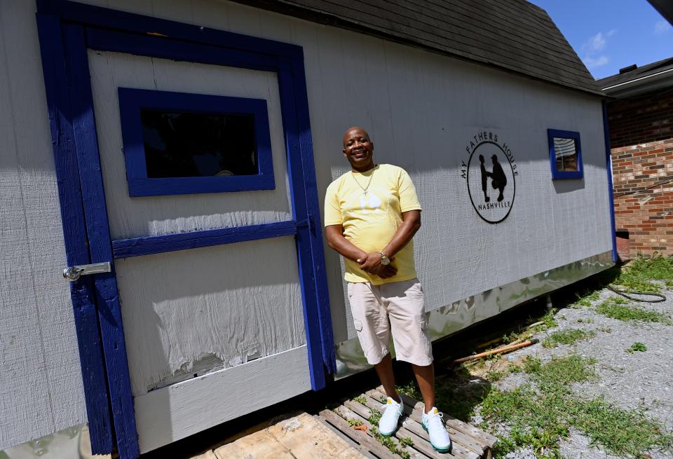 Thomas Gooch stands in front of his sober living shed where he helps addicted dads recover and reconnect with their families on Wednesday, August 24, 2022, in Nashville, Tenn.