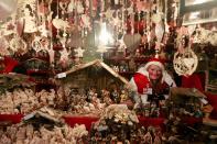 NUREMBERG, GERMANY - NOVEMBER 30: Christmas decorations hang for sale at a stand at the traditional Christmas market 'Nuernberger Christkindlesmarkt' ahead of the opening ceremony on November 30, 2012 in Nuremberg, Germany. Originated in the 16th century the Nuremberg Christmas market is seen as one of the oldest of its kind in Germany. (Photo by Johannes Simon/Getty Images)