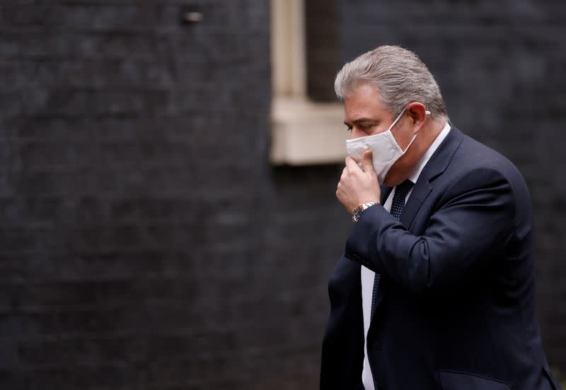 Secretary of State for Northern Ireland Brandon Lewis is seen outside Downing Street in London