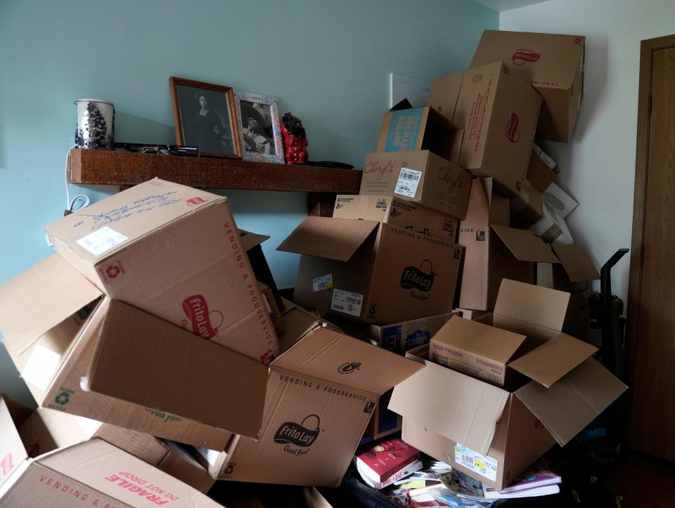 May 1, 2024; Columbus, Ohio, USA; 
A pile of moving boxes sits in the entryway of Sheryl Brown’s townhome on Griggsview Court in the Walden Woods neighborhood near Hilliard. Brown has lived in the complex for many years, creating memories with her family.