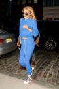 <p>In a neon blue track suit, Amiri sneakers and Roberi & Fraud sunglasses while out in New York. </p>