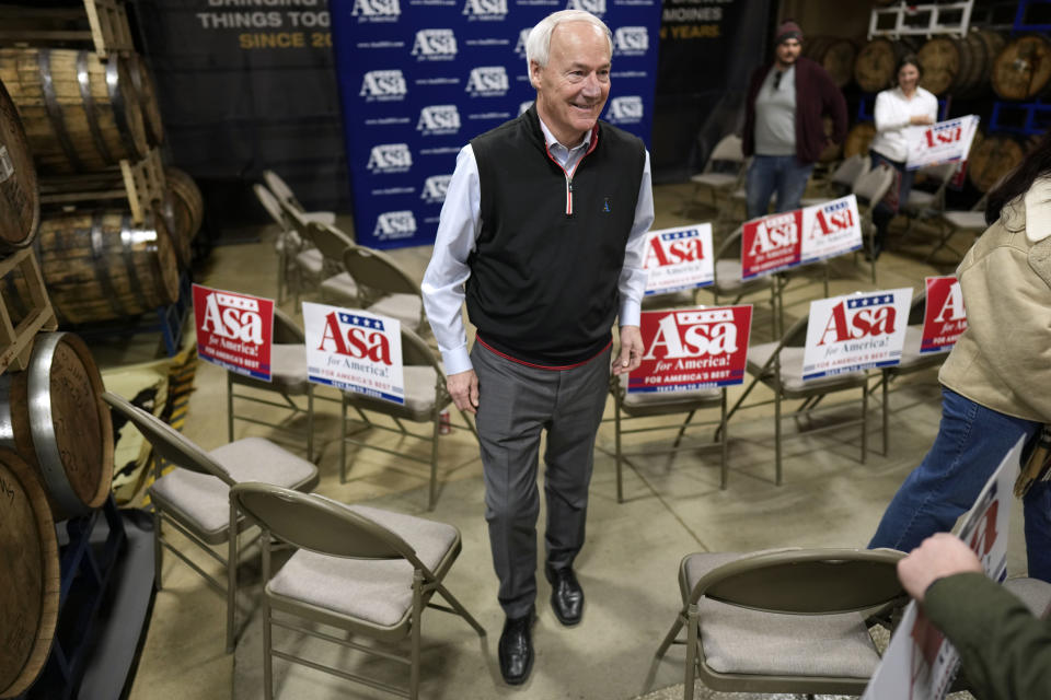 Republican presidential candidate former Arkansas Gov. Asa Hutchinson leaves a campaign event, Wednesday, Jan. 3, 2024, in Des Moines, Iowa. (AP Photo/Charlie Neibergall)