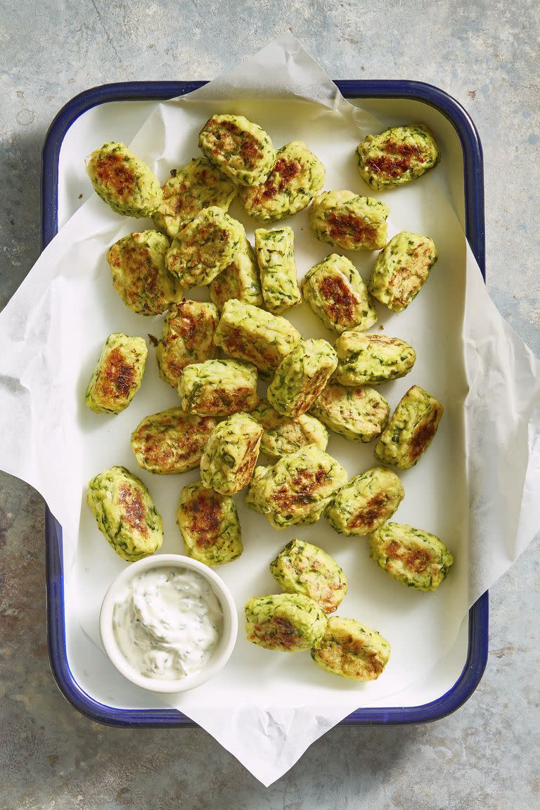 <p>Like the potato ones, but summer-friendly. Balance the tot's fresh flavor with homemade marinara sauce. </p><p><em><a href="https://www.goodhousekeeping.com/food-recipes/a45726/zucchini-tots-recipe/" rel="nofollow noopener" target="_blank" data-ylk="slk:Get the recipe for Zucchini Tots »;elm:context_link;itc:0;sec:content-canvas" class="link ">Get the recipe for Zucchini Tots »</a></em></p><p><strong>RELATED:</strong> <a href="https://www.goodhousekeeping.com/food-recipes/g562/zucchini-recipes/" rel="nofollow noopener" target="_blank" data-ylk="slk:50+ Zucchini Recipes That Are Easy, Healthy and Delicious;elm:context_link;itc:0;sec:content-canvas" class="link ">50+ Zucchini Recipes That Are Easy, Healthy and Delicious</a></p>