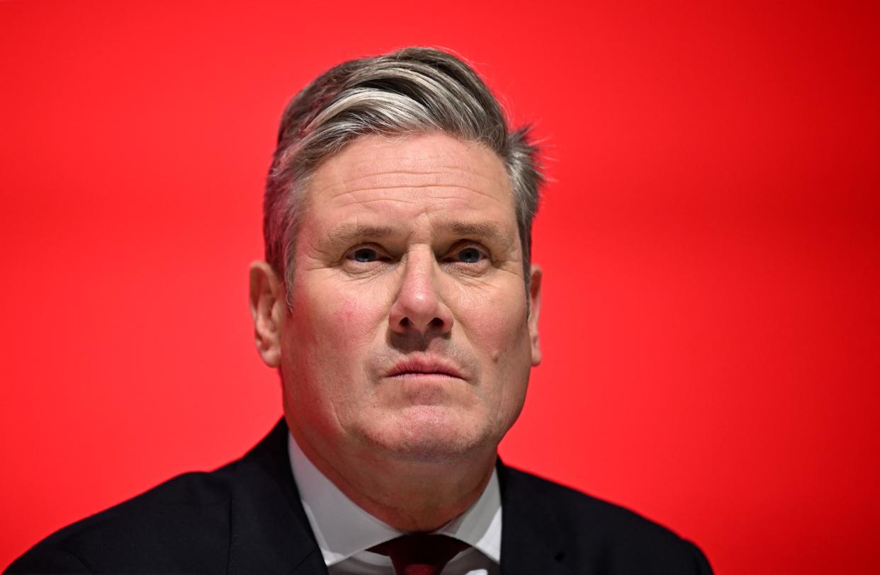 Britain's main opposition Labour Party leader Keir Starmer listens to a speaker on the third day of the annual Labour Party conference in Liverpool, north west England on September 27, 2022. (Photo by Oli SCARFF / AFP) (Photo by OLI SCARFF/AFP via Getty Images)