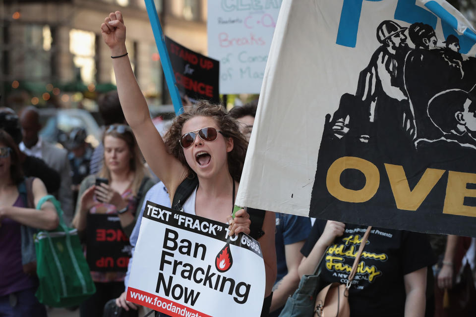 <p>Demonstrators protest President Donald Trump’s decision to exit the Paris climate change accord on June 2, 2017 in Chicago, Ill. (Scott Olson/Getty Images) </p>