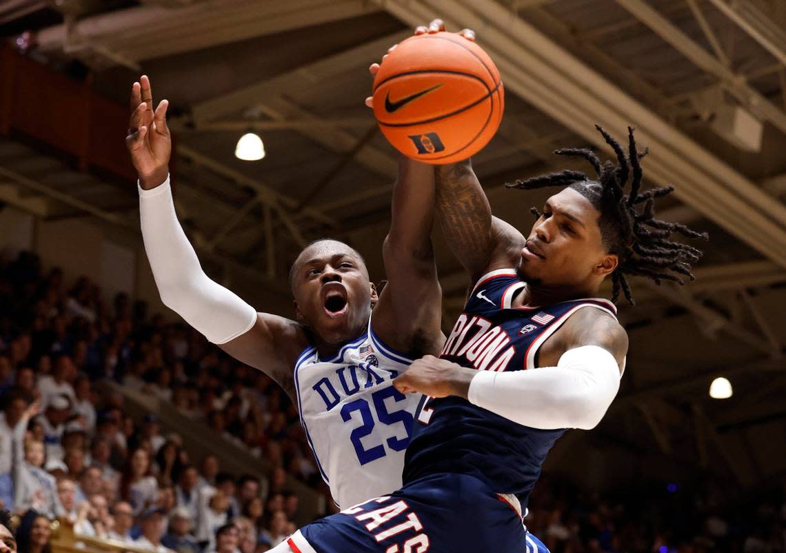 Arizona’s Caleb Love (2) blocks the shot by Duke’s Mark Mitchell (25) during the first half of Duke’s game against Arizona at Cameron Indoor Stadium in Durham, N.C., Friday, Nov. 10, 2023.