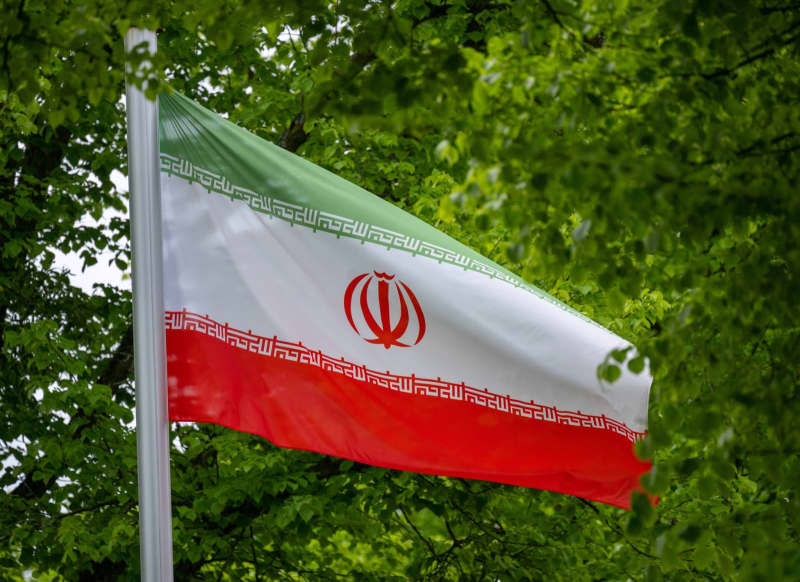 The flag of the Islamic Republic of Iran flies in front of the state's embassy in Berlin. Monika Skolimowska/dpa