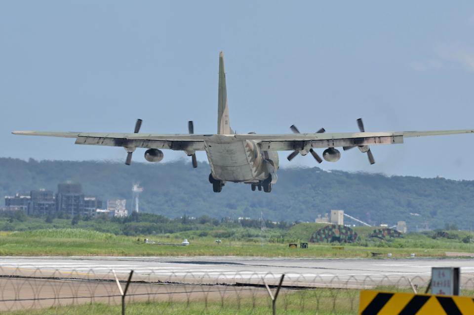 A US-made C-130 aircraft prepares to land on a runway at the Hsinchu Air Base in Hsinchu on 5 August 2022 (AFP via Getty Images)