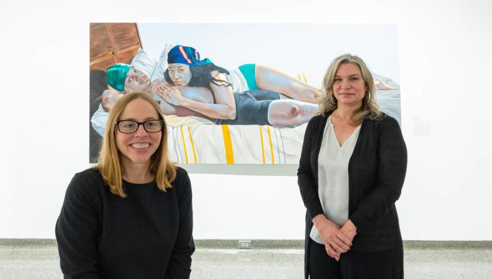 Wichita Art Museum curator Tera Hedrick, left, and director Anne Kraybill said that selling a Henry Moore sculpture from the museum’s collection will allow new purchases that focus on its mission of showing American art. Kraybill said new works such as Robert Peterson’s “Sunday Kind of Love,” shown here, are creating a new, inclusive dynamic at WAM. “We’ve seen just what those new acquisitions have done for the community excitement and the buzz and people actually (are) like, ‘I can see myself here.’ ” Travis Heying/The Wichita Eagle