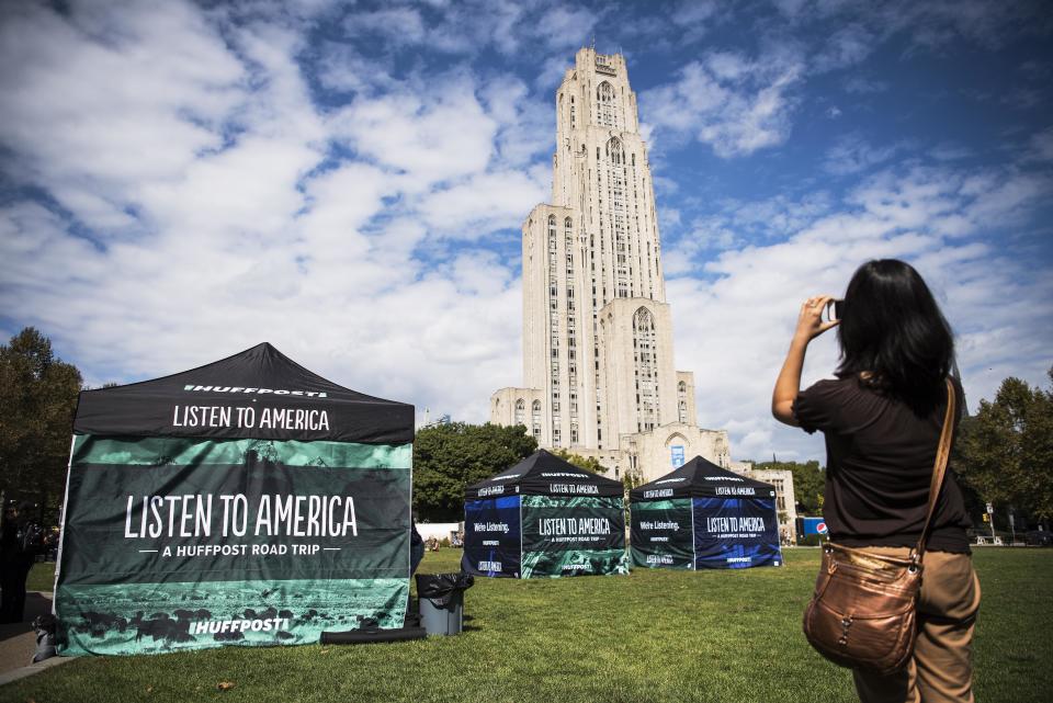 Marina Fang takes a photo of the Cathedral of Learning building.