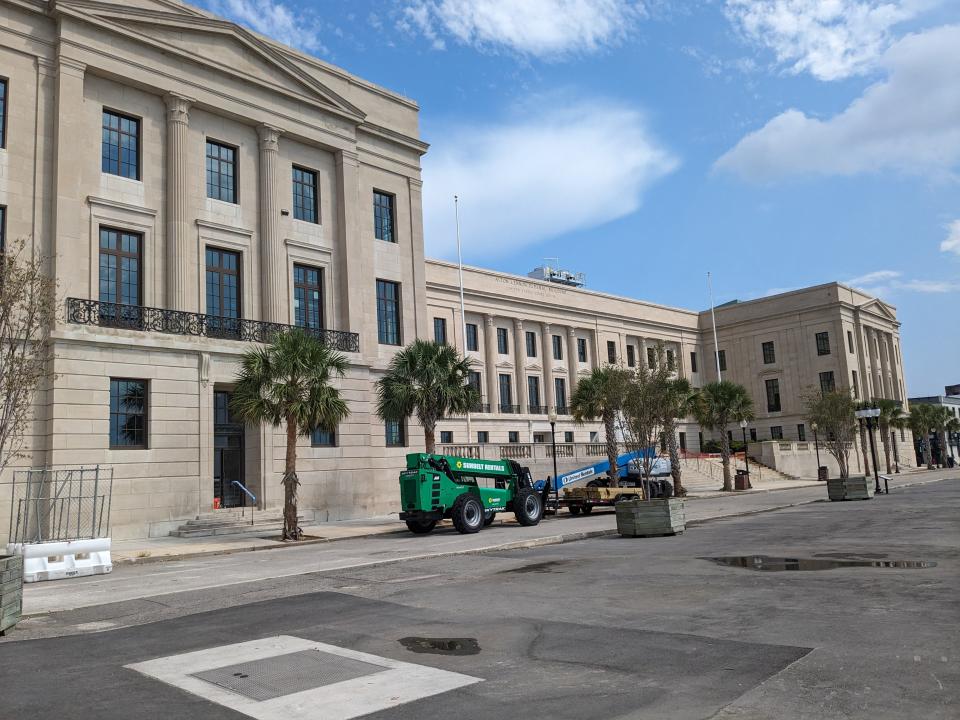 Most of the barriers and fencing around Wilmington's federal courthouse has been removed, and the fountain also has been turned back on.