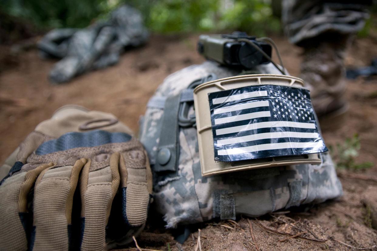 Helmet and gloves belonging to a paratrooper assigned to 173rd Airborne Brigade - Credit: U.S. Army