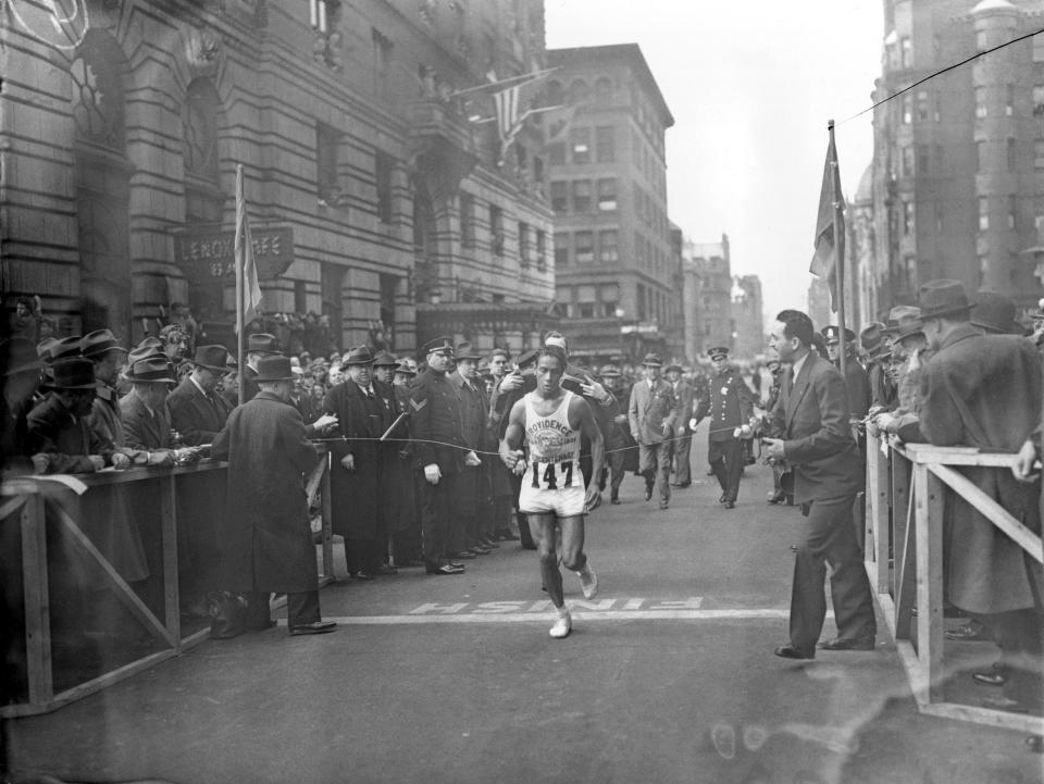 Ellison M. "Tarzan" Brown, a member of the Narragansett Tribe from Rhode Island, breaks the tape to win the 40th annual Boston Marathon on April 19, 1936. His victory inspired the name "Heartbreak Hill."