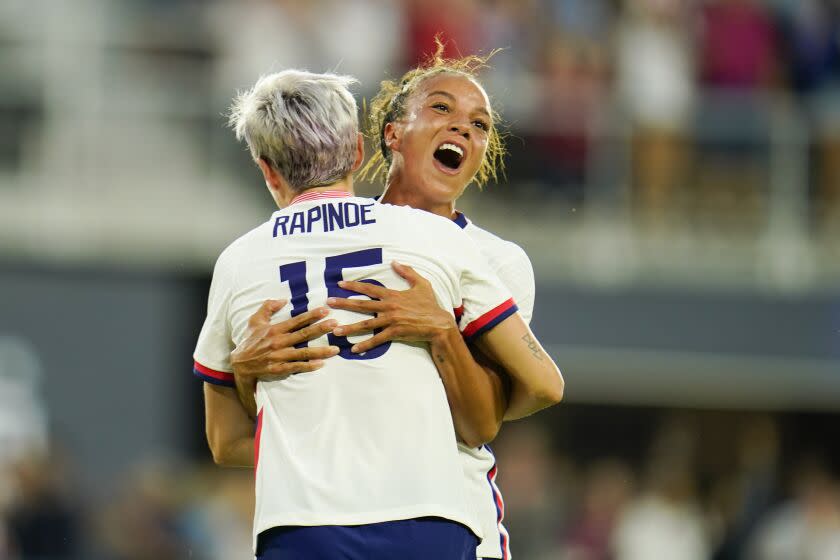 United States' Megan Rapinoe, left, and Mallory Pugh celebrate a goal by Rose Lavelle during the second half of the team's international friendly soccer match against Nigeria, Tuesday, Sept. 6, 2022, in Washington. (AP Photo/Julio Cortez)