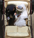 <p>The Duke and Duchess of Sussex ride in an Ascot Landau along the Long Walk after their wedding in St George’s Chapel in Windsor Castle (PA) </p>