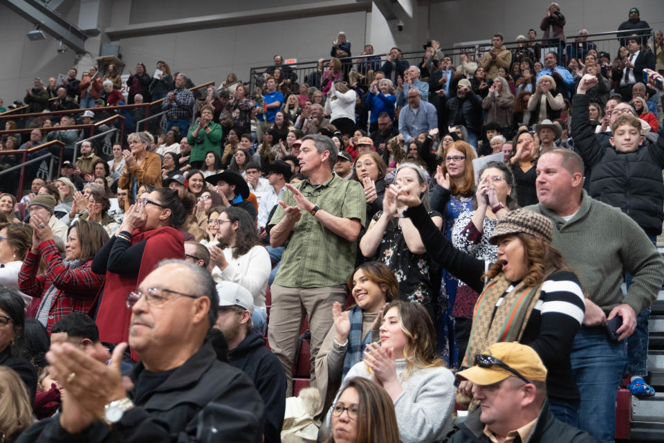The crowd applauds the 2023 WT graduates at the WT commencement ceremony Saturday morning at the First United Bank Center in Canyon.
