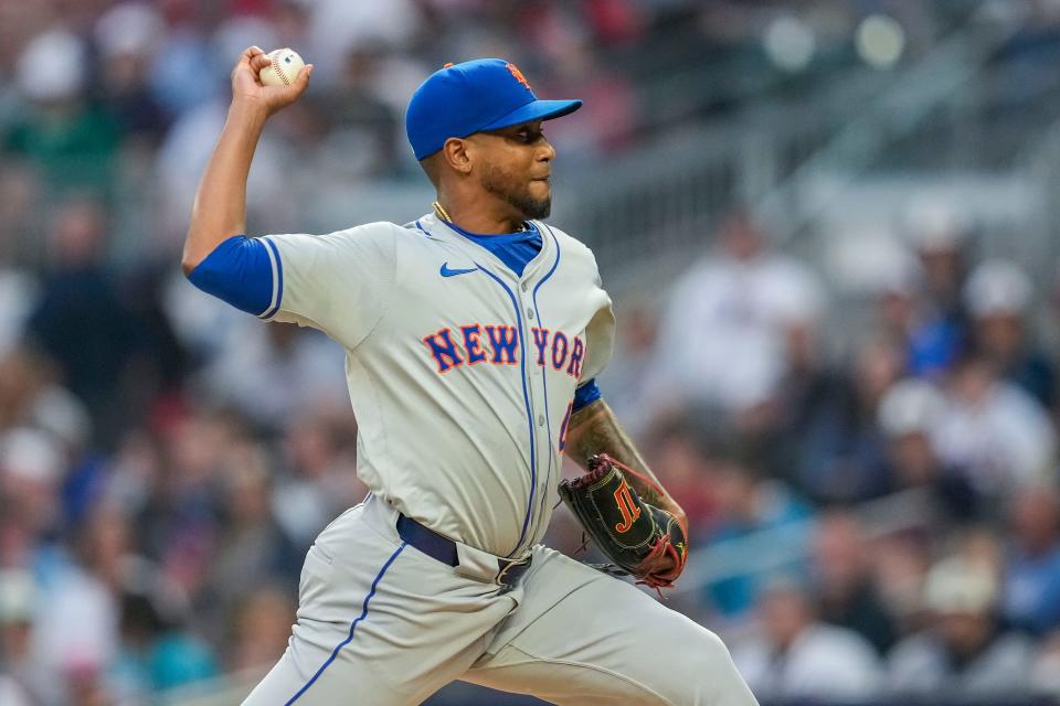 New York Mets starting pitcher Julio Teheran (49) pitches against the Atlanta Braves during the first inning on April 8, 2024, at Truist Park.