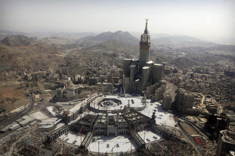 <strong>The tallest clock tower in the world with the world's largest clock face at the Abraj Al-Bait Towers overlooks the Grand Mosque and its expansion in Mecca, Saudi Arabia, Wednesday, Oct. 16, 2013.</strong>