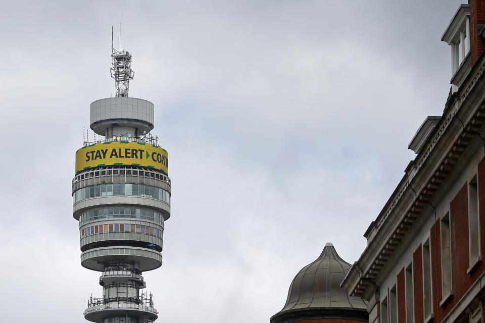 The British Government's new COVID-19 slogan "Stay Alert, Control the Virus, Save Lives" is pictured on the BT (British Telecom) tower, in central London on May 13, 2020, as people start to return to work after COVID-19 lockdown restrictions were eased. - Britain's economy shrank two percent in the first three months of the year, rocked by the fallout from the coronavirus pandemic, official data showed Wednesday, with analysts predicting even worse to come. Prime Minister Boris Johnson began this week to relax some of lockdown measures in order to help the economy, despite the rising death toll, but he has also stressed that great caution is needed. (Photo by ISABEL INFANTES / AFP) (Photo by ISABEL INFANTES/AFP via Getty Images)