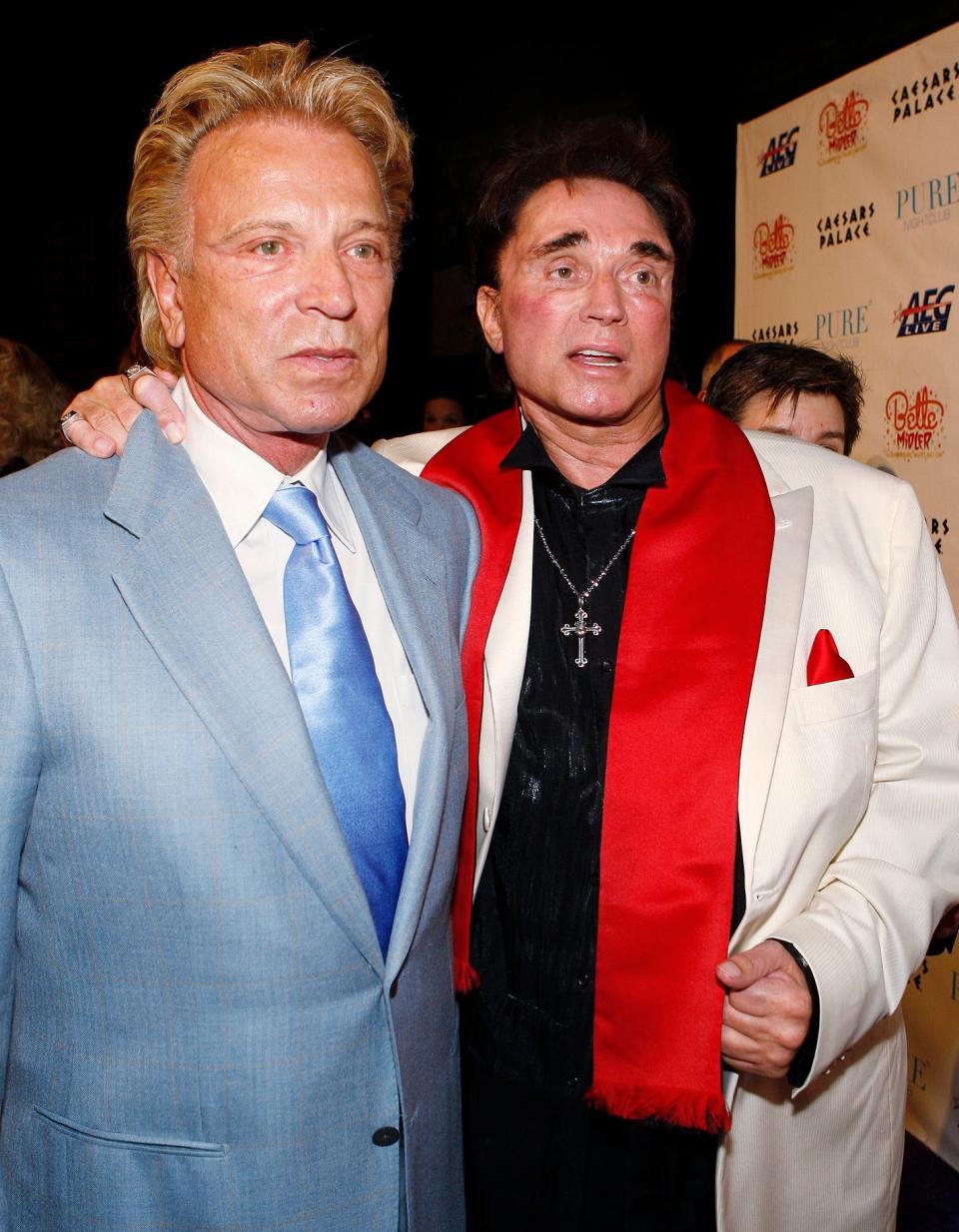 In this Feb. 20, 2008 file photo, Siegfried Fischbacher, left, and Roy Horn arrive at a party following the premiere performance of Bette Midler's "The Showgirl Must Go On" at Caesar's Palace hotel and casino in Las Vegas.