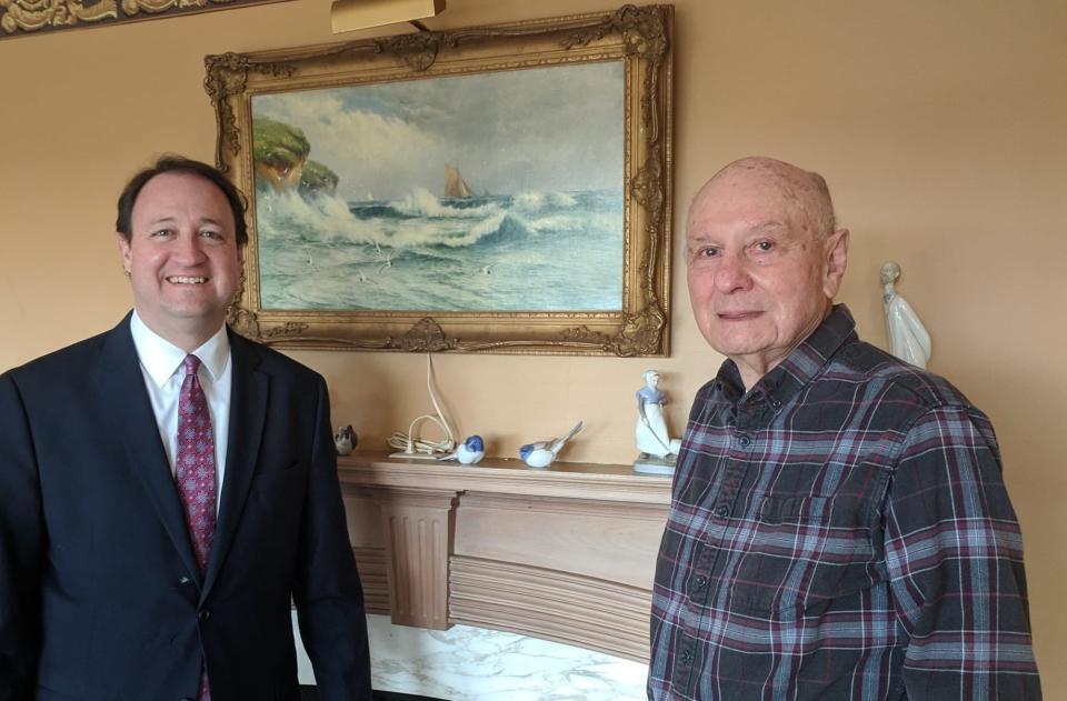 John Morris, left, and William Marshall stand in Marshall's house in 2018. Marshall was found stabbed to death in his home on Jan. 6, 2021. He had been a generous donor to the Peoria Riverfront Museum as well as an avid art collector and sailor.